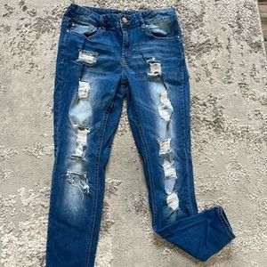 Distressed skinny jeans size 8